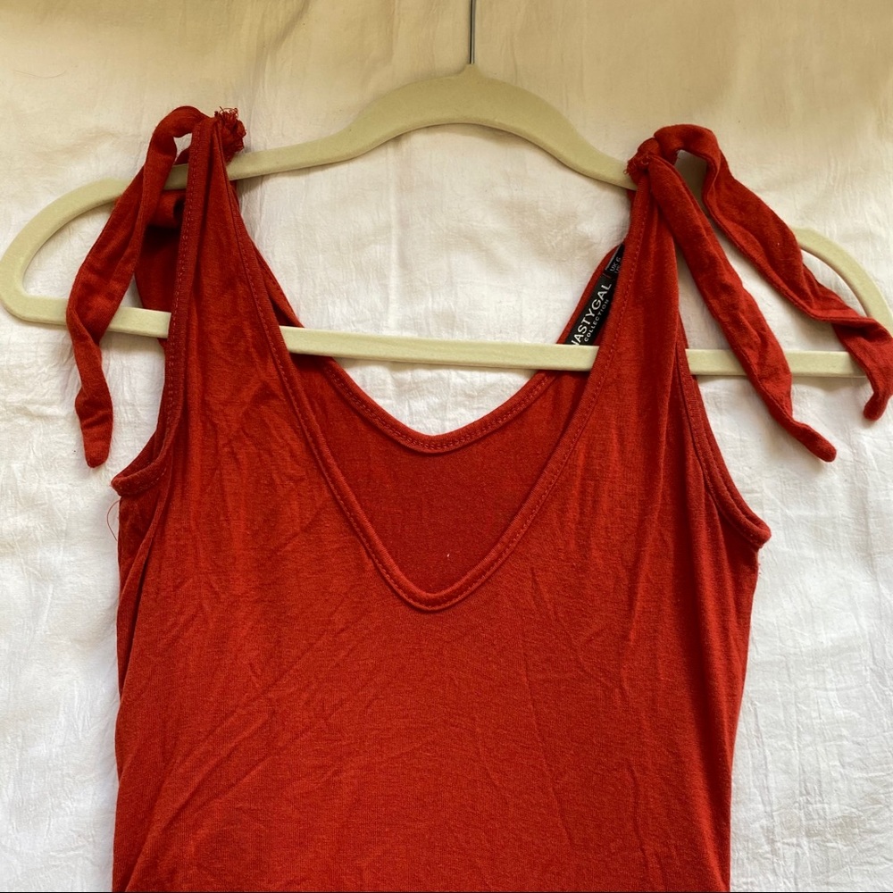 Red plunge body suit